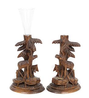 A Pair of Black Forest Style Carved Wood Candle Bases Height 13 1/2 x width 9 x depth 7 inches.