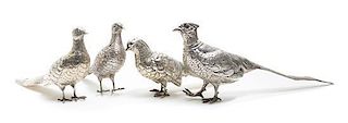 Four Silver Bird Figurines Largest height 5 3/4 x width 3 x length 16 inches.