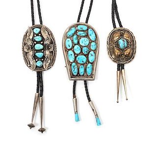 Three Silver and Turquoise Navajo Bolos Height of largest 3 1/2 x 2 1/4 inches.
