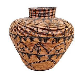 A Western Apache Pictorial Basket Height 21 1/2 x diameter 24 inches.