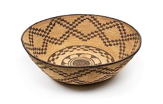 An Apache Basketry Bowl Height 4 3/4 x 14 1/2 inches.