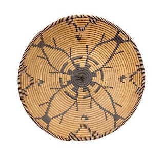 An Apache Basket Tray Height 3 1/4 x diameter 15 3/4 inches.