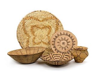 Five Southwestern Baskets Diameter of largest 23 inches.