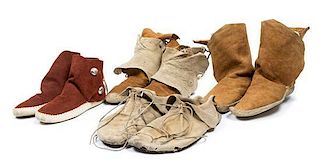 Four Pairs of Southwestern Moccasins Length of longest pair 10 1/4 inches.