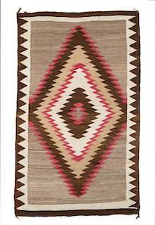 A Navajo Rug 67 x 40 inches.