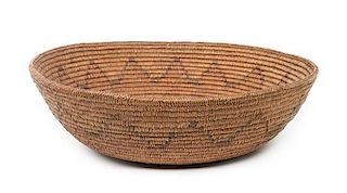 A Navajo Basketry Bowl Height 5 1/2 x diameter 17 3/4 inches.