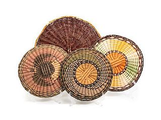 Eight Hopi Basket Trays Diameter 14 1/4 inches.