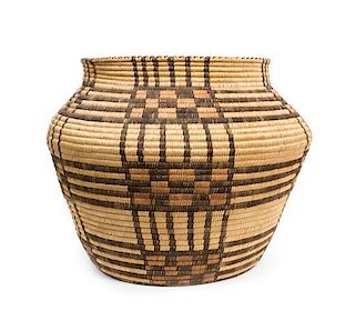 A Papago Basket Jar Height 13 x diameter 11 3/4 inches.
