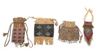 Four Southwestern Beaded Pouches Height of largest 10 x 7 1/4 inches.