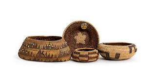 Four Pomo Miniature Baskets Height of largest 2 1/8 x length 4 1/2 inches.