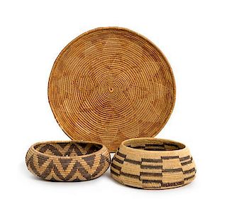 Three California Baskets Height of largest 1 1/2 x diameter 11 1/4 inches.
