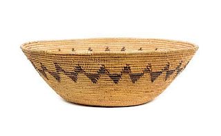 A Mission Indian Basket Bowl Height 5 1/2 x diameter 16 1/2 inches.