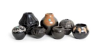 Seven Carved Blackware Pueblo Bowls First height 4 x diameter 3 1/4 inches.