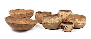 Seven California Hupa/ Yurok Area Baskets Height of largest 7 x diameter 18 inches.