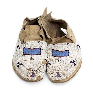 A Pair of Arapaho Beaded Moccasins Length 11 1/2 inches.