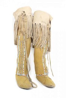 A Pair of Kiowa Beaded Boots Length 27 inches.