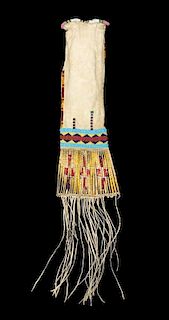 A Cheyenne Beaded and Quill Pipe Bag Length overall 26 x width 4 1/2 inches.