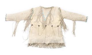 A Southern Cheyenne Hide Shirt Length 29 inches.