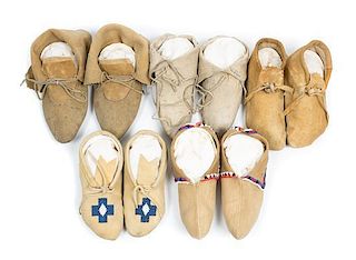 Five Pairs of Soft Soled Moccasins Length of longest 10 inches.