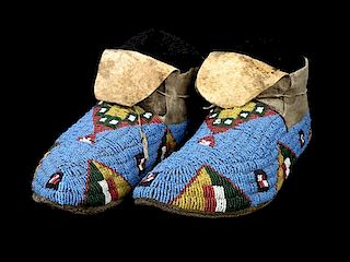 A Pair of Sioux Beaded Moccasins Length 10 inches