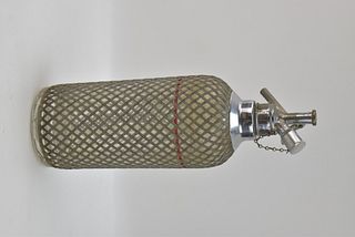 VINTAGE SPARKLETS NEW YORK WIRE MESH AND GLASS SELTZER BOTTLE