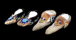 Two Pairs of Delaware Beaded Moccasins Length of longer 9 3/4 inches.