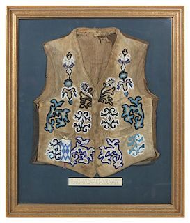 An Osage Fabric and Beaded Vest Frame: 33 x 28 1/4 inches.