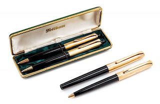 A Collection of Four Pelikan Writing Instruments Length of first 5 1/4 inches.