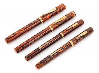 A Collection of Four Vintage Waterman's Fountain Pens Length of longest 5 1/2 inches.