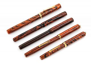 A Collection of Five Vintage Waterman's Fountain Pens Length of longest 51/2 inches.