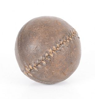A 19th Century Lemon Peel Leather Baseball 