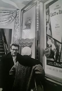 Dennis Stock, James Dean in front of East of Eden poster, NYC
