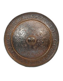 Cast-iron Hall Shield with Pan and Crab Motifs.