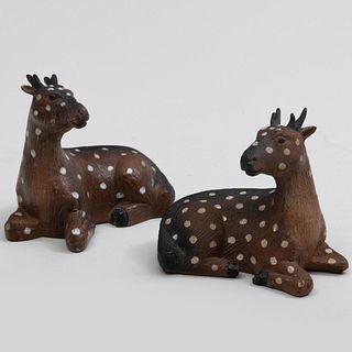 Pair of Small Chinese Stoneware Models of Recumbant Deer