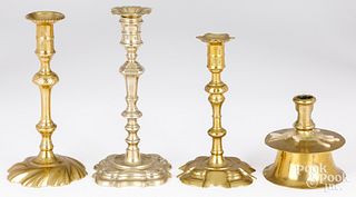 Four early candlesticks