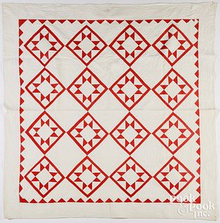 Red and white Ohio Star patchwork quilt