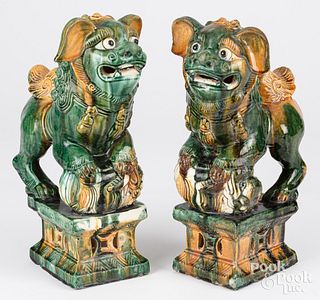 Pair of Chinese earthenware foo dogs