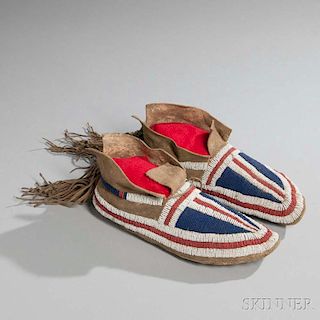 Pair of Southern Plains Beaded Buffalo Hide Moccasins