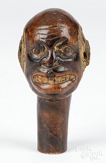 Carved figural Black Americana cane end, 19th c.