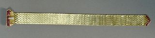 14K mesh bracelet buckle style set with 29 rubies and three diamonds, mid 20th century. 42.7 grams. lg. 7 3/4in.