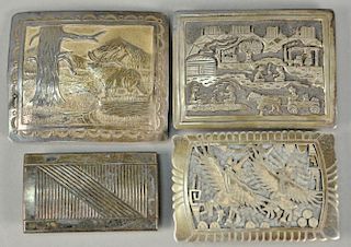 Four Western Navajo Native American Indian sterling silver belt buckles, one marked Wadsworth, one marked TSK, and one marked