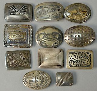 Eleven sterling silver Navajo Native American Indian buckles marked S. Walker, Carmen, CB, CAS, and Begaye. largest: 1 1/2" x