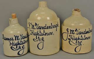 Three various size stoneware jugs, each marked in blue James M. Vandenbergh Highstown N.J. 11in. to 16 1/2in. Provenance: Col
