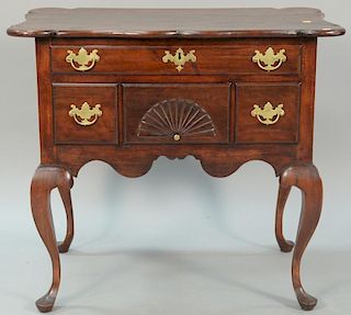 Queen Anne style cherry lowboy with shaped top made up of old wood. ht. 31in., 21 1/2" x 33"