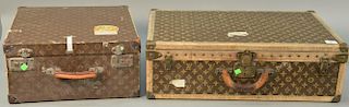 Two Louis Vuitton suitcases one with tray, back is taped 27 3/4" x 17 1/4" x 8 1/2" and one with changed hardware 18" x 18" x