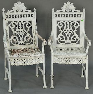 Pair of Victorian iron armchairs, each signed Wm. Adams Foundry 960 N. 9th St. Phila. ht. 38 1/2in., wd. 19 1/2in. Provenance