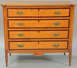 Sheraton four drawer chest with banded inlaid and birdseye maple drawer fronts, set on turned legs, circa 1830. ht. 38 1/2in.