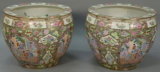 Pair of large famille rose fish bowls, late 20th century (one as is with hairline). ht. 20in., dia. 25in. Provenance: Collect