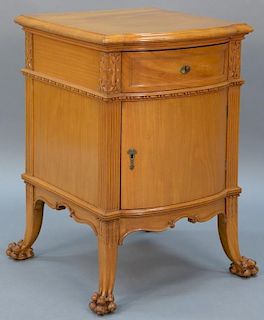 Satinwood stand with shaped top over bowed drawer over bowed door set on paw feet.  height 30 inches, top: 22" x 20 1/2"  Pro