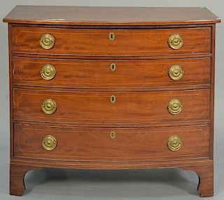 Chippendale mahogany bowed front four drawer chest with line inlay set on cut out bracket feet (both side edges have missing 